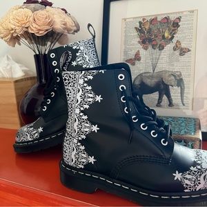 Genuine Doc Marten boots with “lace” detailing. Worn only once.